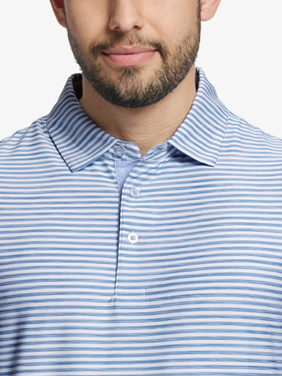 Close-up from nose to chest of SKY BLUE WHITE polo with fresh, airy watercolor stripe design