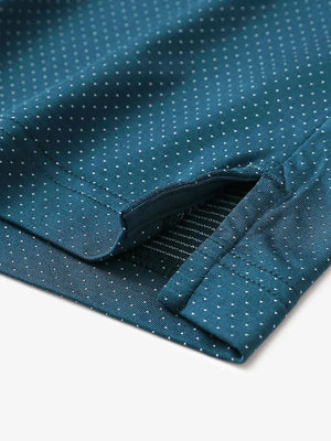 Detail of side slit hem on LYONS BLUE 4 Way Stretch Jacquard Polo — clean stitching and stretch finish