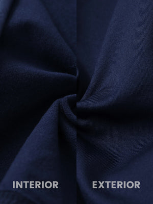 Close-up of fleece-lined fabric on women's lightweight puffer jacket, showing texture in navy.
