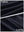 Close-up texture of navy blue women's stretch a-line golf skort with 7 pockets fabric showing detailed outer and inner lining material.
