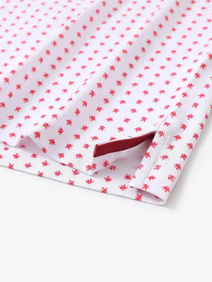 Hem slit detail of MAELREG Performance Jersey Print Polo in White Red Lion – comfort & movement