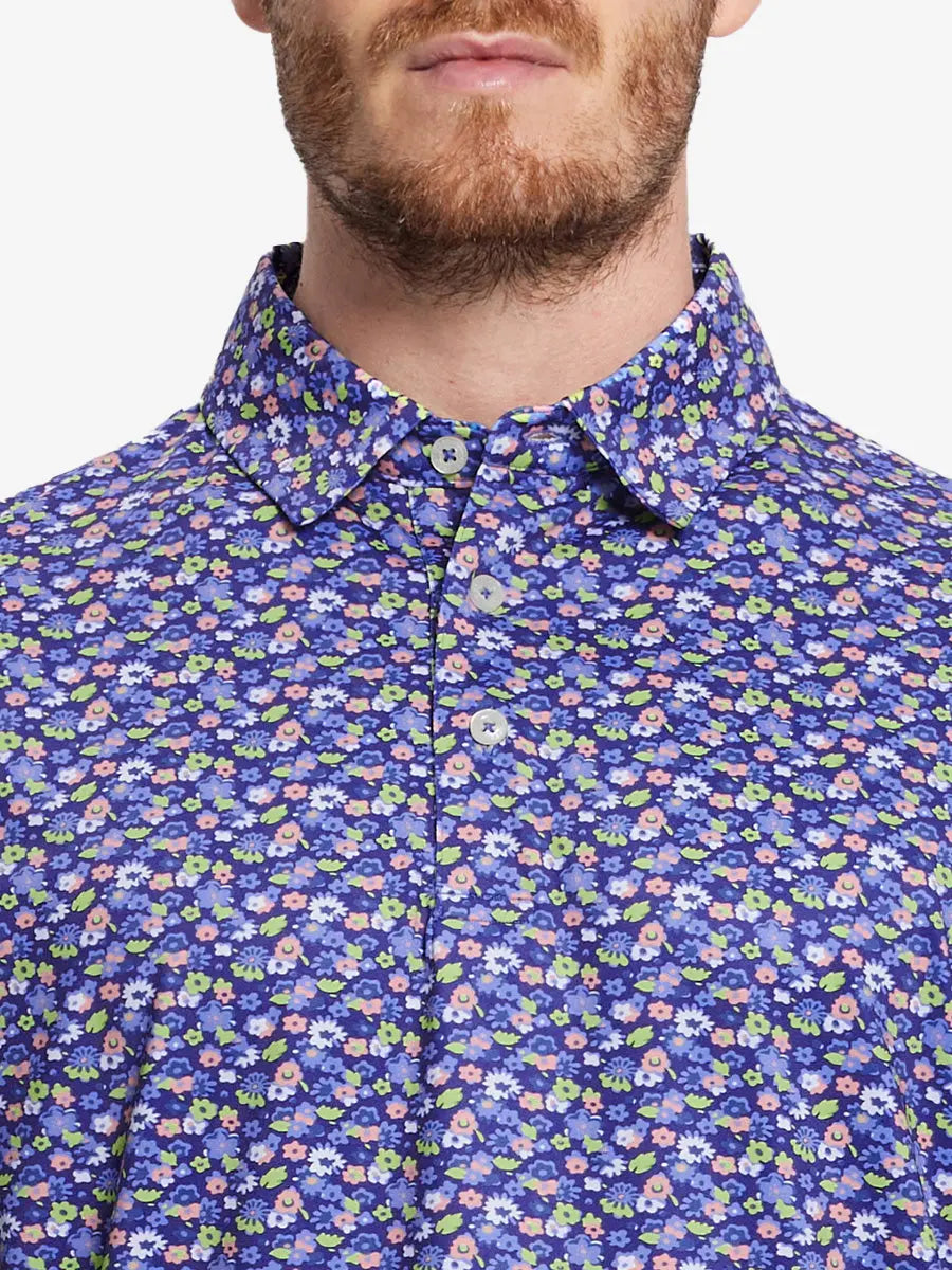 Elegant and sporty in navy blue with a beautiful floral pattern, it's perfect for any golf event.