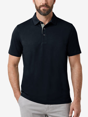Front upper body shot of model wearing navy  ultra-comfort slim fit roma knit polo shirts