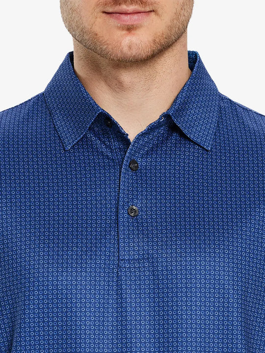 Dark blue load pattern polo shirt, model shows off its classic design and sporty comfort.