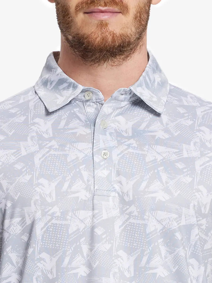 Grey abstract pattern polo shirt, model showcases its modern artistic style combined with sporty appeal.