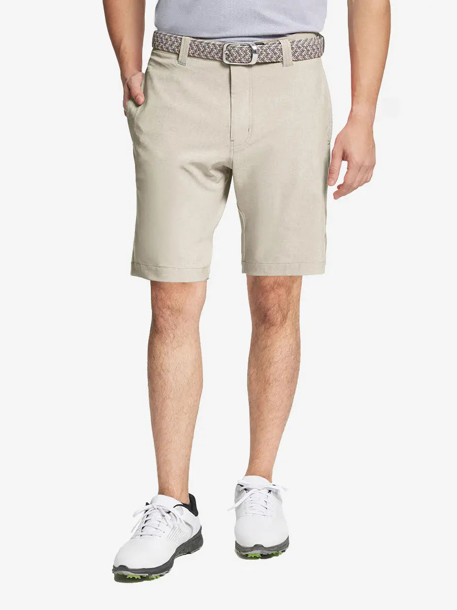 DARK BLUE 9 Inch Heather Performance Golf Shorts with front view, model's lower body and side pockets visible