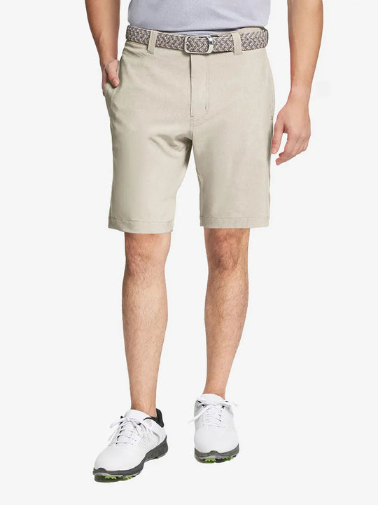 DARK BLUE 9 Inch Heather Performance Golf Shorts with front view, model's lower body and side pockets visible