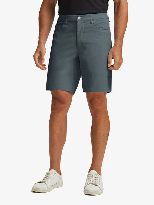 DARK GREY 4-way Stretch Performance Solid Shorts, golfer front lower body with club, 9 Inch view