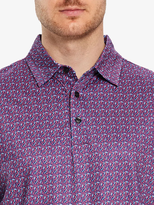  geometric pattern polo shirt, model shows off its modern design and vibrant energy.