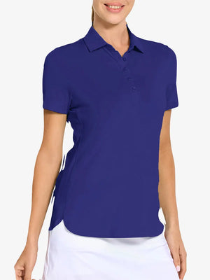 Front view from nose to hem of model wearing KLEIN BLUE Women's Performance Solid Polo with skirt