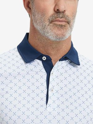 Close-up from nose to chest, showing collar and fabric pattern detail of the white nav clue polo shirt.