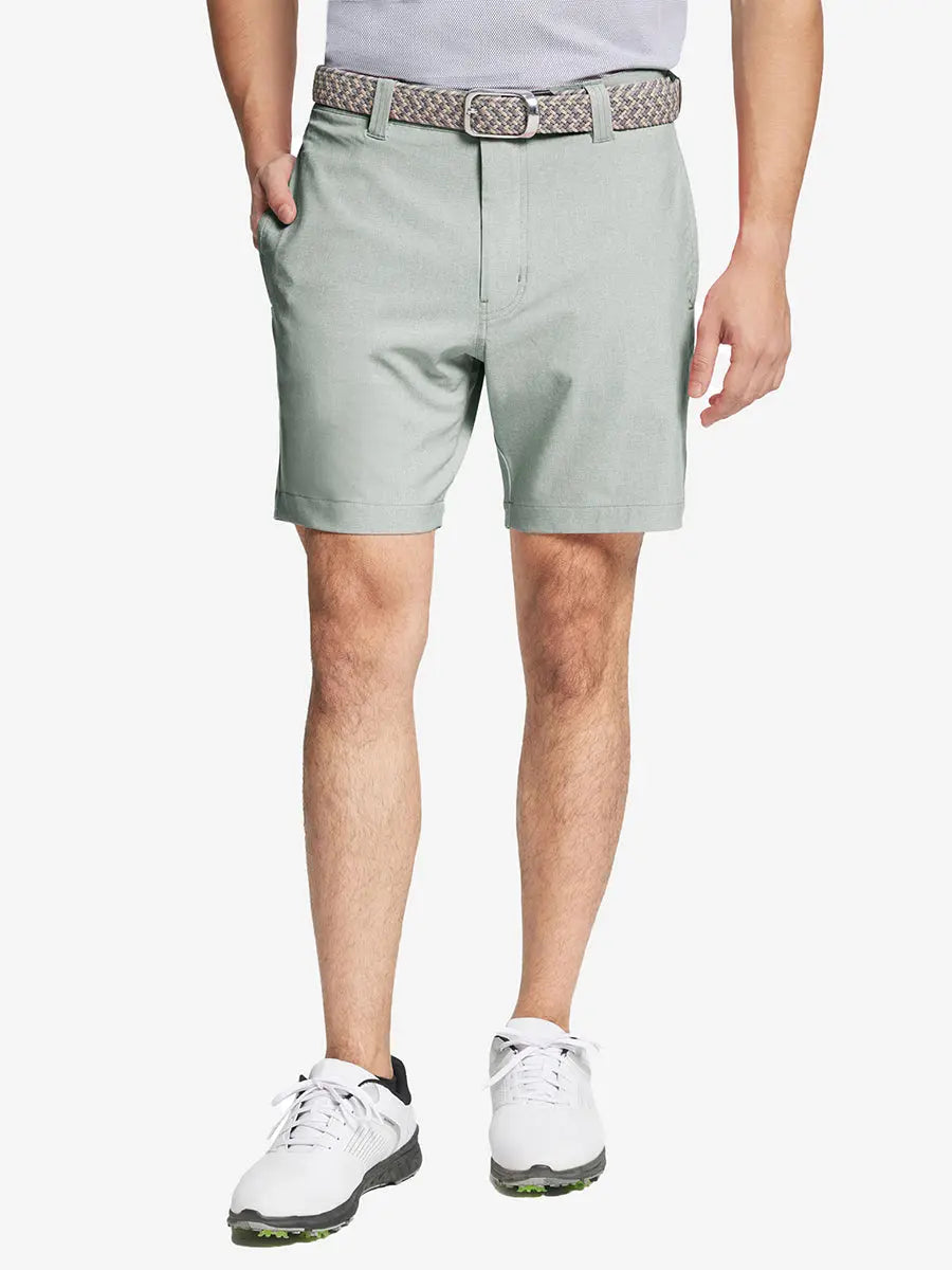 GLACIER GREY 7 Inch Heather Performance Golf Shorts with front view, model's lower body and side pockets visible