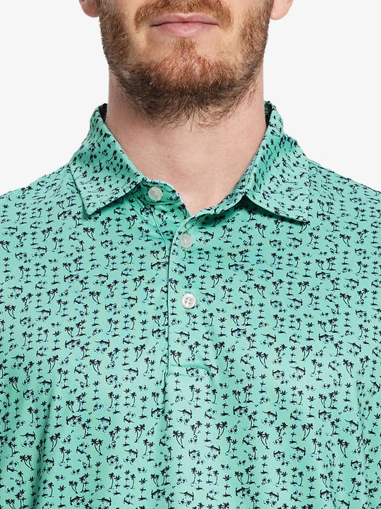 Mint seaside palm pattern polo shirt, model shows its fresh and natural design, perfect for a sporty and relaxed look.