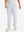 Model wearing misty grey fleece stretch water resistant boys joggers, front view showing lower body and pants.