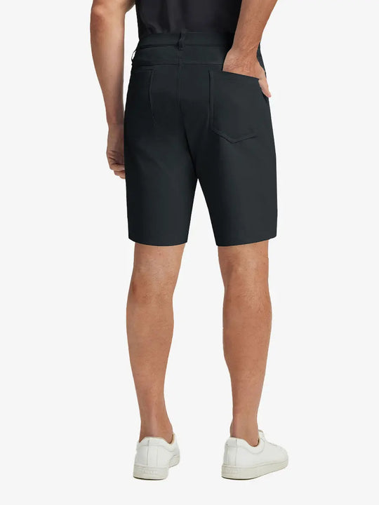 BLACK 4-way Stretch Performance Solid Shorts, back lower body view for golf wear, 9 Inch style