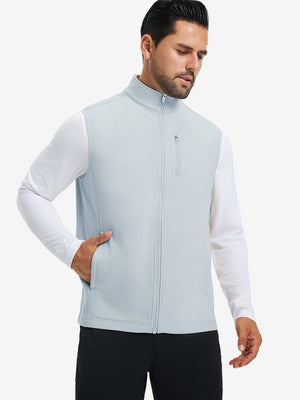 Model wearing water-resistant fleece golf vests, hand in side pocket, relaxed fit in misty grey