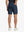 NAVY 4-way Stretch Performance Solid Shorts, back lower body view for golf wear, 7 Inch style