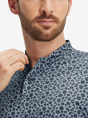Close-up: nose to chest in grayish blue flower stretch printed collarless henley golf shirts