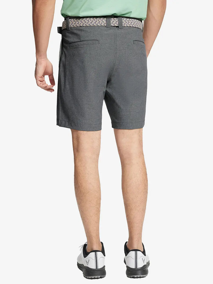 DARK GREY 7 Inch Heather Performance Golf Shorts back view, model's lower body with hands in pockets