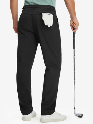 Model holding a golf club with one hand, back lower body shot wearing black thermal water repellent fleece dress pants