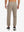 Back lower body view showing light brown heather soft sweatpants with 4 zipper pockets