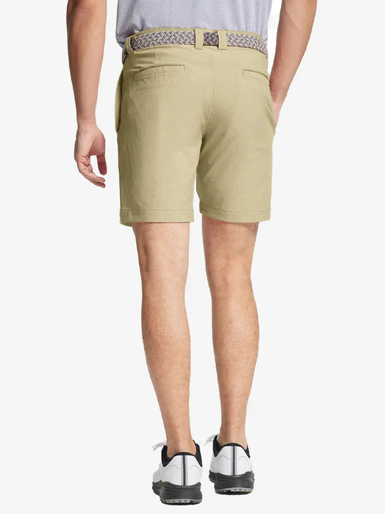 KHAKI 7 Inch Heather Performance Golf Shorts back view, model's lower body with hands in pockets