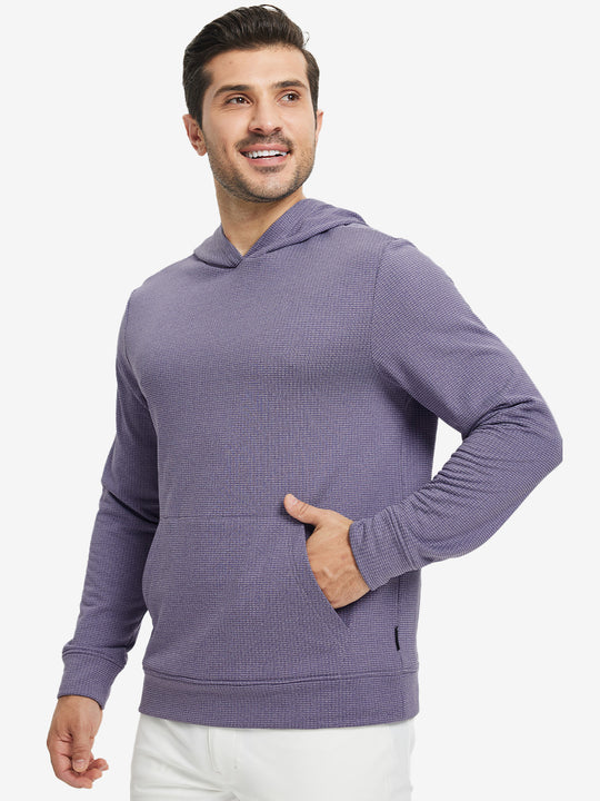 Model front view with one hand in side pocket wearing warm fleece golf hoodies pullover purple.