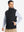 Model front half-body shot with one hand in pocket wearing sleeveless softshell fleece outdoor vests with 6 pockets in black