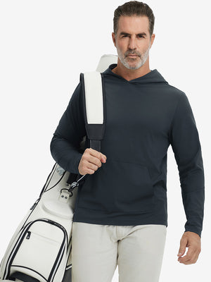 Model carrying golf bag, styled in dark grey dry fit stretchy sweatshirts hoodie, modern athletic look.
