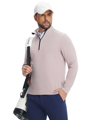 Model wearing two tone pique cotton blend q-zip in khaki, hand in pocket with tennis bag