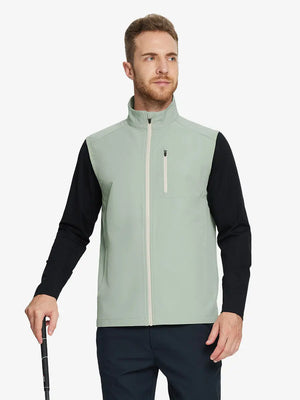 wearing the light green windproof golf vest, holding a golf club, showcasing its vibrant color and functional design.