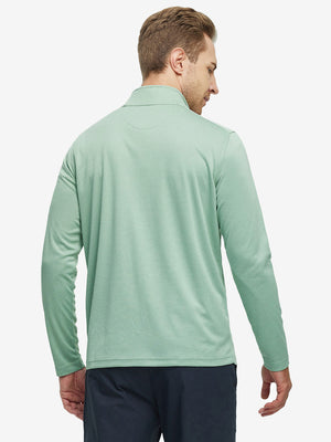 Back waist-up shot of model wearing beryl green melange moisture wicking quarter zip pullover