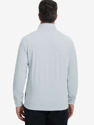 Back upper body view of the misty grey lightweight golf pullover, model turns head slightly with ease.