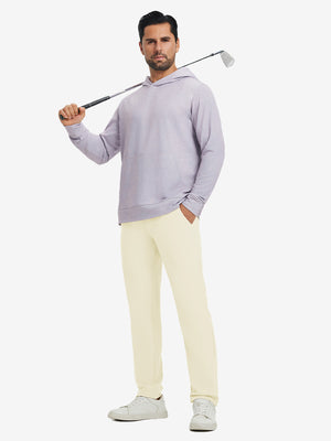 Model holding a golf club on shoulder, wearing beige water-resistant golf stretch nylon pants.