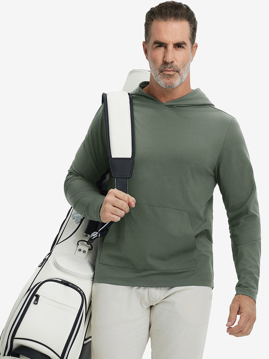 Model carrying golf bag, styled in olive green dry fit stretchy sweatshirts hoodie, modern athletic look.