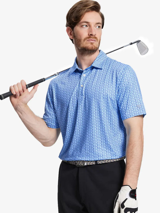 Model showcases the blue navy dogs pattern polo, highlighting its playful design and comfortable fit.