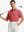Half-body front view of model holding golf club wearing CRANBERRY Stylish Chest Print Snap Polo