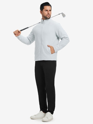 Model carrying a golf club on shoulder, wearing black lightweight moisture wicking dress pants.