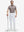 Front full body shot of model wearing white breathable casual slacks with 4 pockets