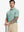 Half-body front view of model holding golf club wearing GREEN HEATHER Premium Stretch Heather Polo.
