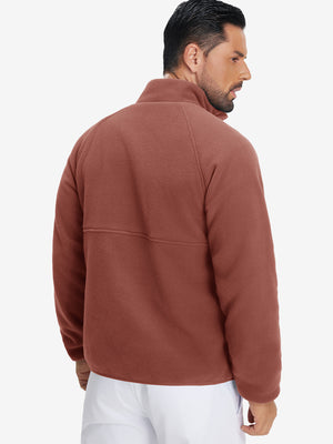Back view of the model in the reversible fleece jacket with 5 pockets in maroon.