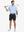Full-body front view of model holding golf club wearing BLACK Water Resistant Versatile 8 Pockets Shorts.