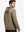 Back upper body view of the brown melange classic heather hoodie, model turns head slightly with ease.