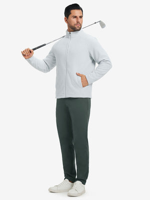 Model carrying a golf club on shoulder, wearing dark green lightweight moisture wicking dress pants.