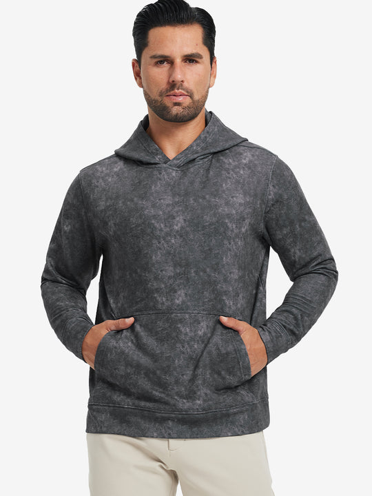 Model in grey exclusive print kangaroo hoodies with hands in pocket, relaxed front upper view.