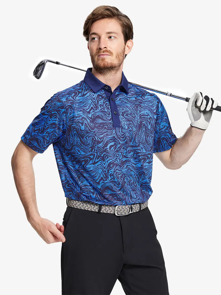 The model is wearing a navy blue swirl patterned polo shirt and holding a golf club, highlighting the dynamic design and sporty style, perfect for golfing occasions.
