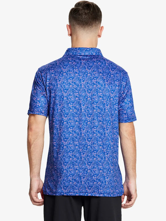 The backside showcases a navy blue paisley patterned model polo shirt, a combination of vintage and sporty styles, showing that style and comfort go hand in hand.
