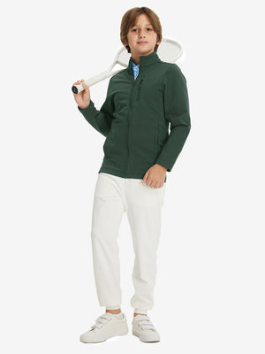 Full-body view of model wearing kids soft lightweight fleece lined jacket in forest green, displaying the jacket's fit and design.