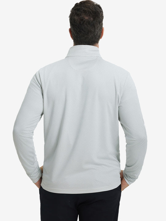 Back upper view of model wearing jacquard quarter zip pullover in light grey, showing clean seam lines.
