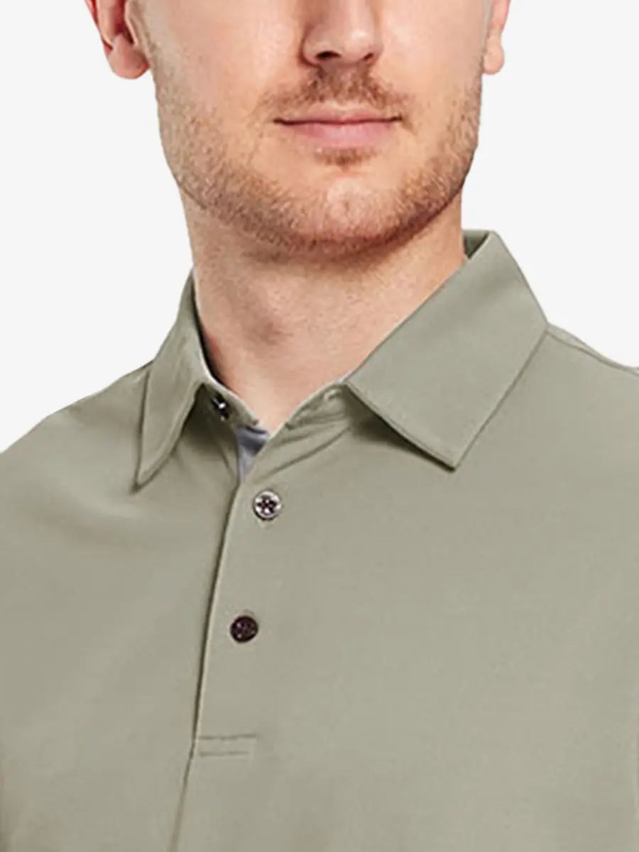 Model front close-up from nose to chest wearing DARK KHAKI Ventilated Pique Performance Polo